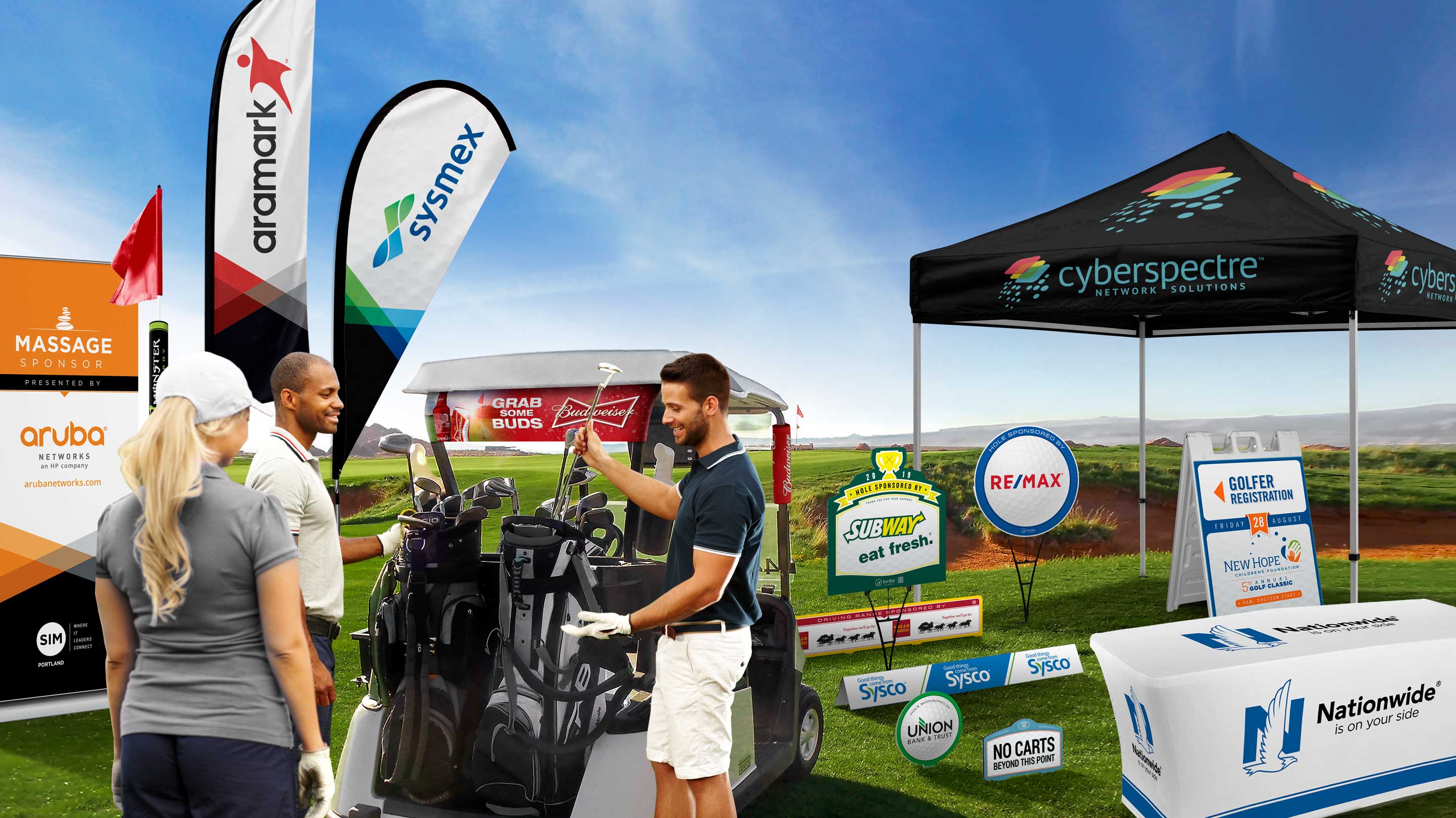 Branded golf tournament signs, flags, sponsor tent and registration display arranged on a golf course